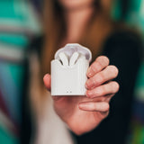 Driftr earbuds and case in hand
